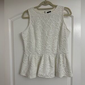 Worthington: Peplum crocheted sleeveless top